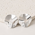 Aretes Acero Inoxidable plateado con forma de pétalo delgado ondulado