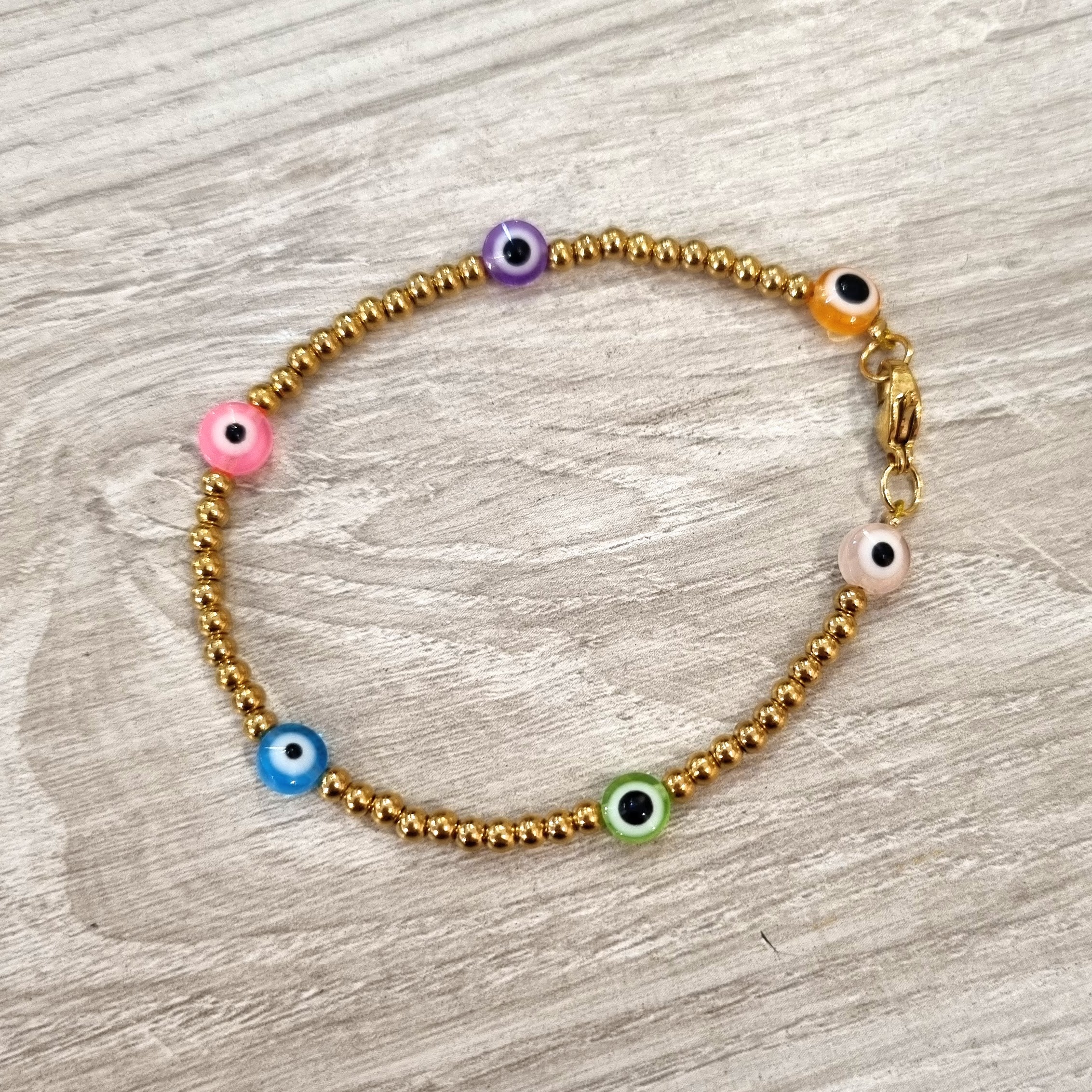 Pulsera Acero Inoxidable Ojitos de Colores