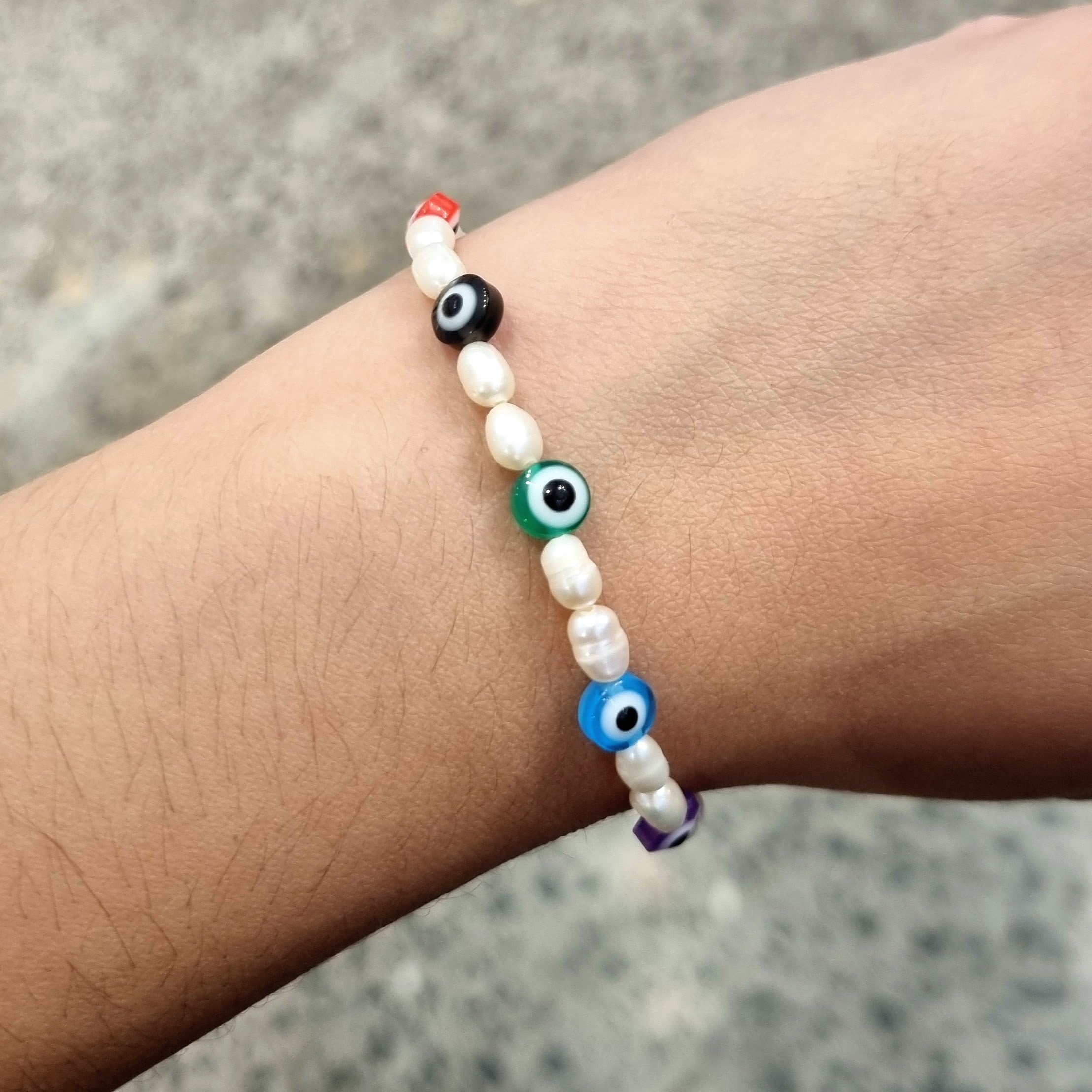 Pulsera Acero Inoxidable Perla Natural con Ojitos