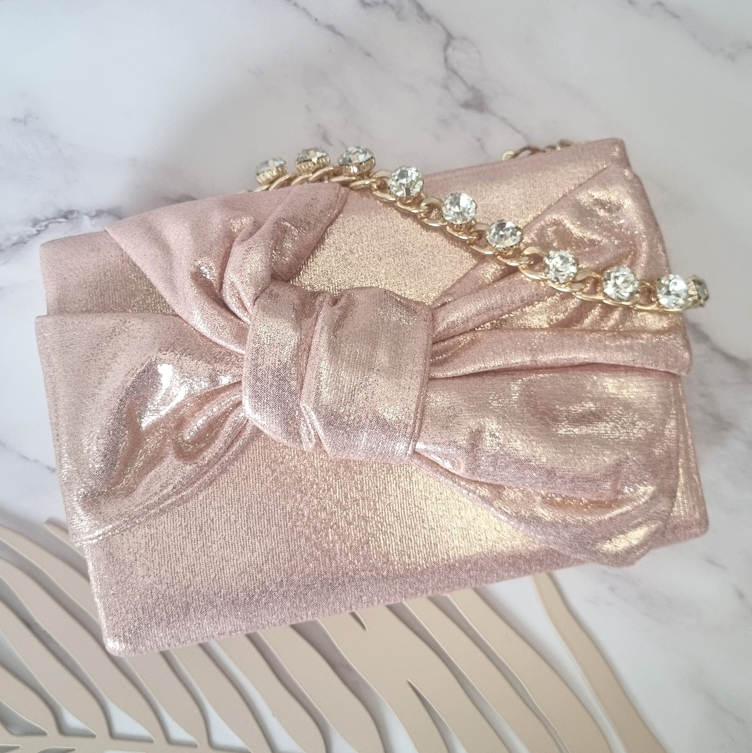 Bolsa Moño Oro Rosa