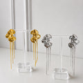 Aretes Acero Inoxidable Flores con textura y 3 cadenas lisas