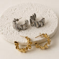 Aretes Acero Inoxidable Media Luna torcido texturizado