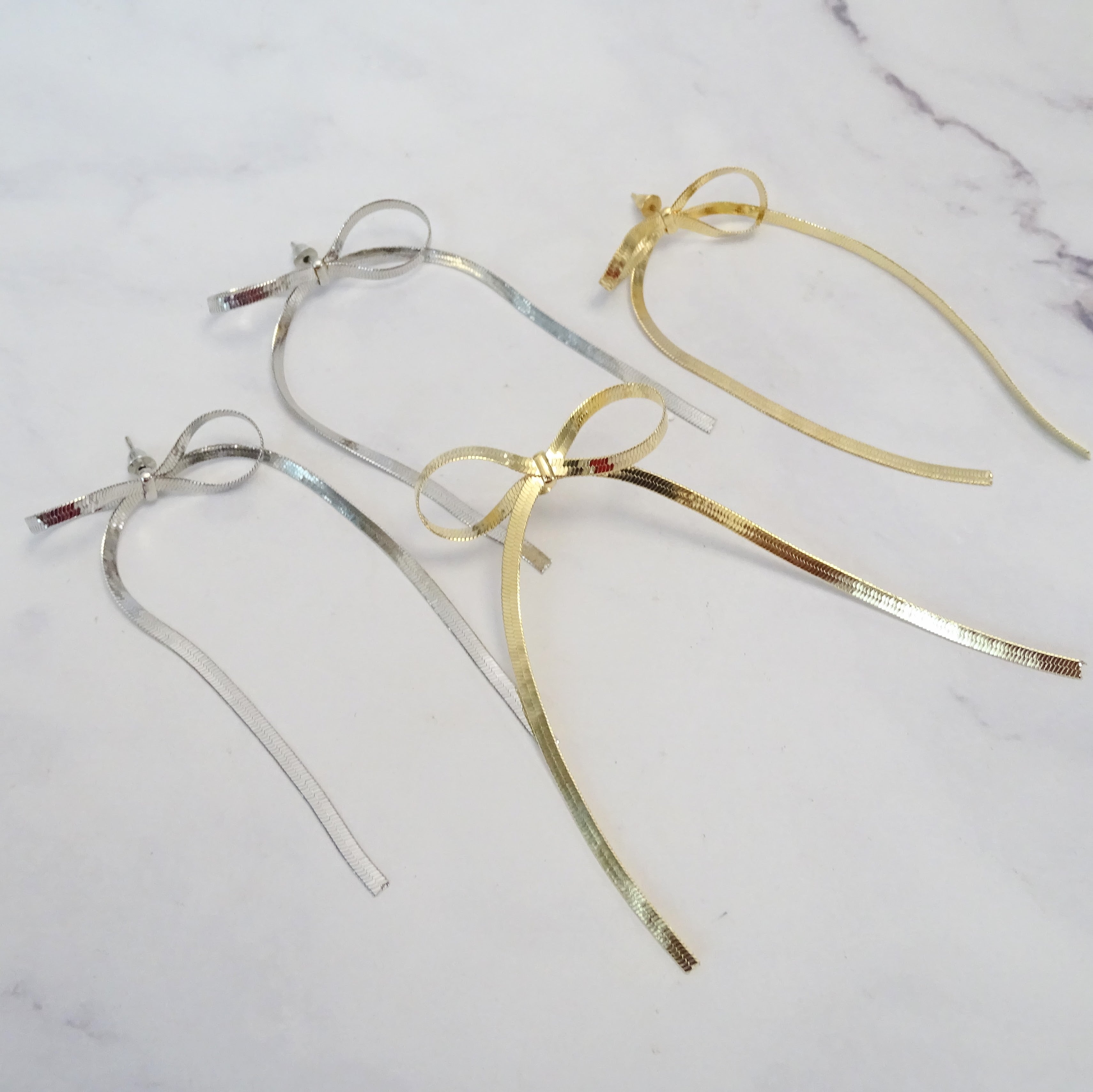 Aretes Acero Inoxidable Moño Largo