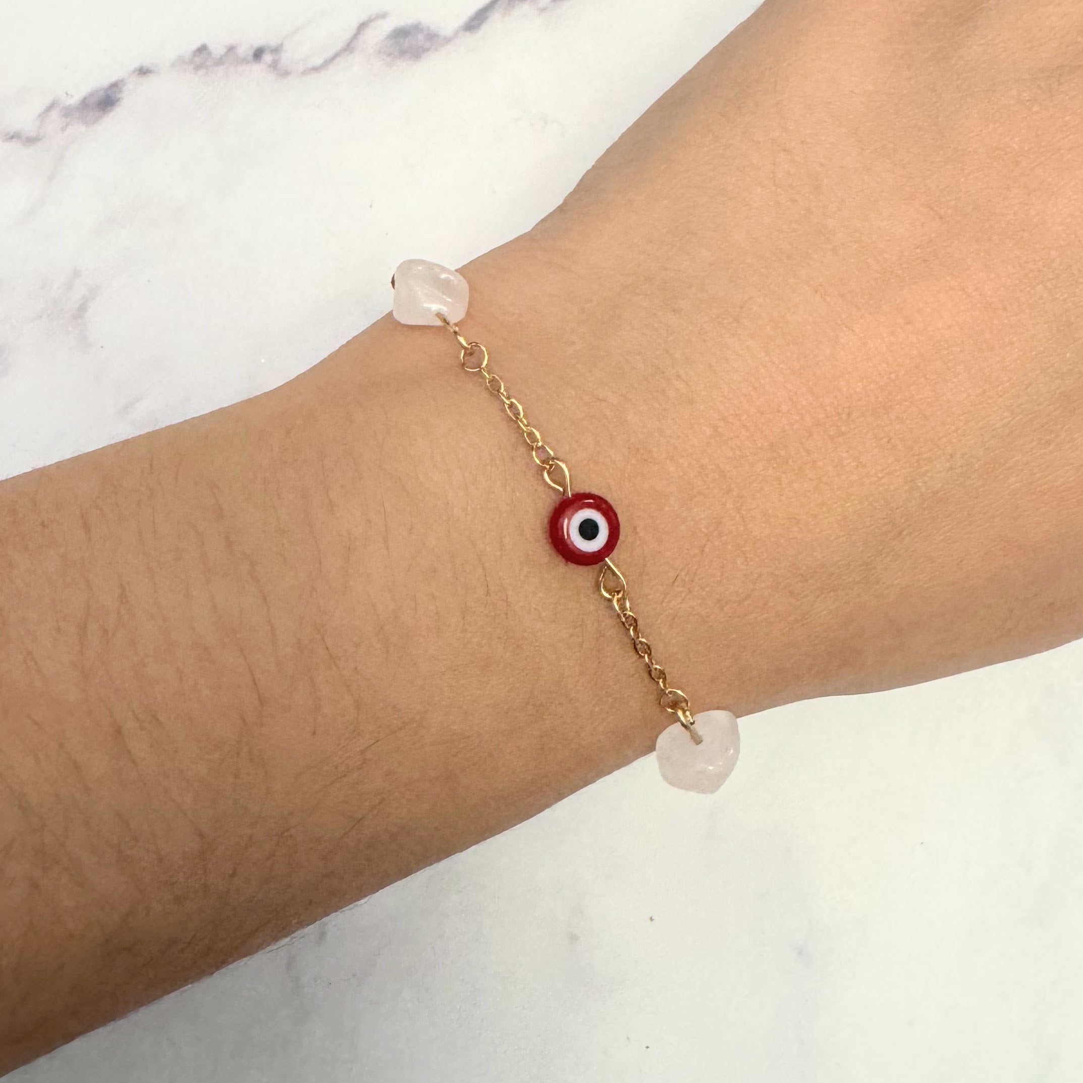 Pulsera Acero Inoxidable Ojito Rojo y Cuarzo