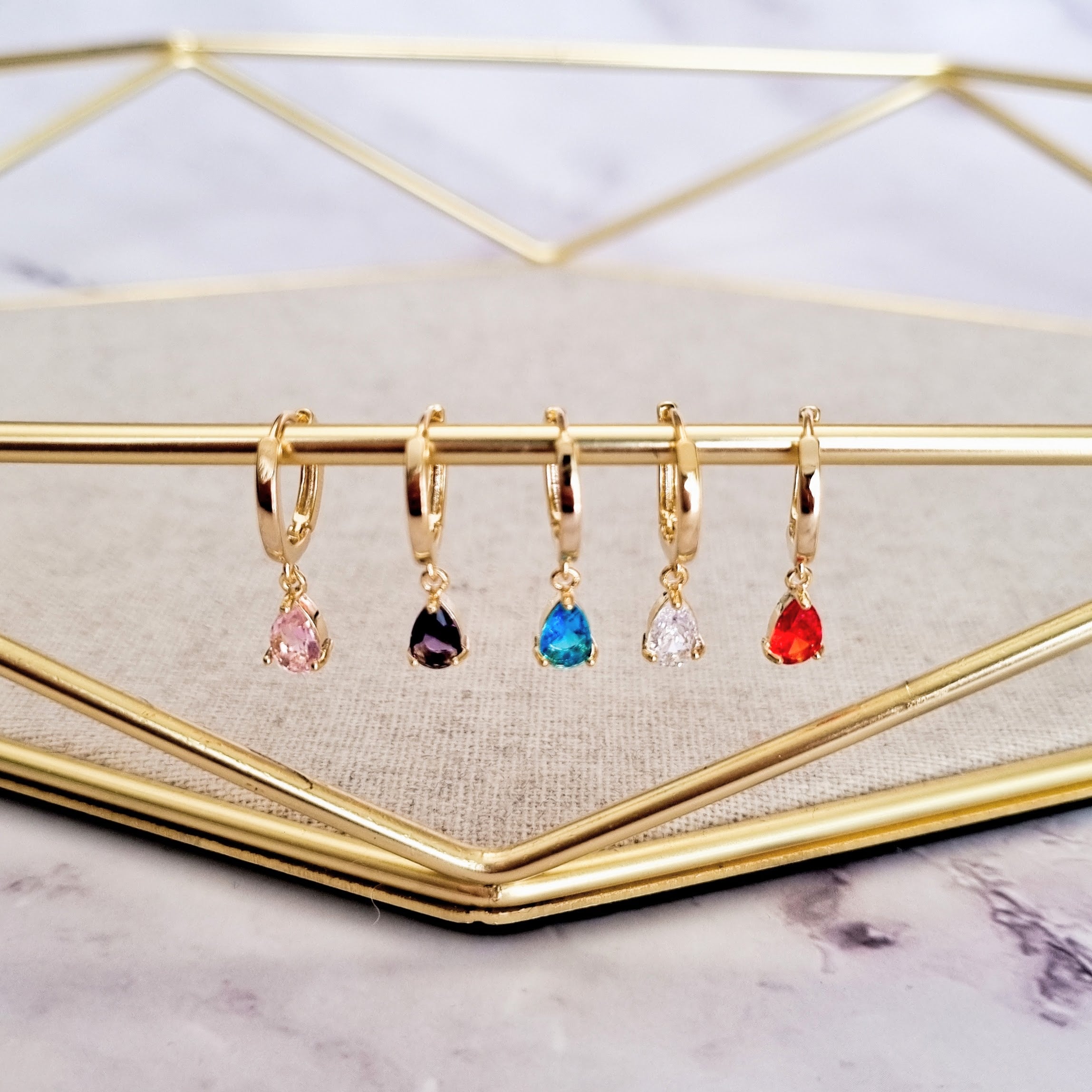 Piercing Chapa de Oro Gotitas