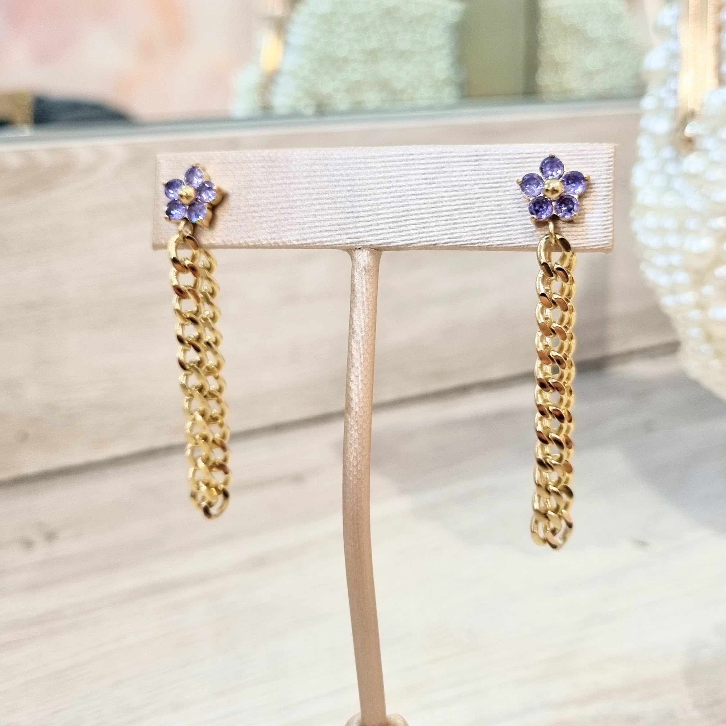 Aretes Acero Inoxidable Flor con Cadena Lila