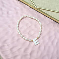 Pulsera Chapa de Oro con Inicial Madre Perla